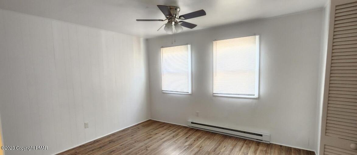 144 Louise Lane Bartonsville, PA 18321 - Photo 7 of 8 an empty room with a window and a fan