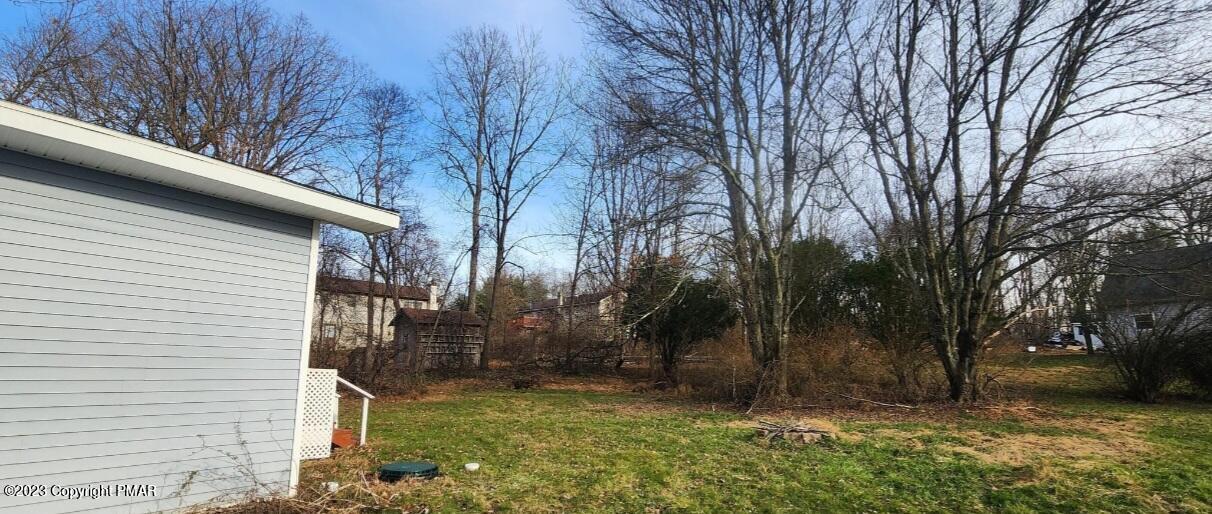 144 Louise Lane Bartonsville, PA 18321 - Photo 8 of 8 a view of a backyard