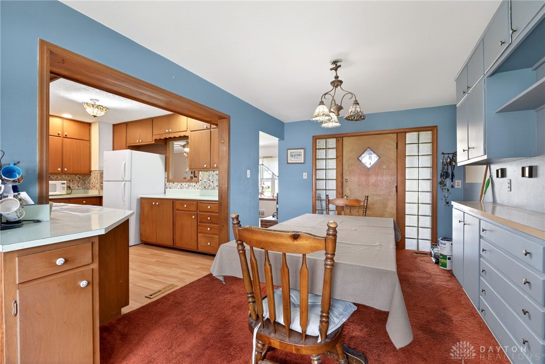 2470 Clark Run Road Xenia, OH 45385 - Photo 50 of 57 This versatile space seamlessly blends dining and kitchen areas, perfect for daily living.