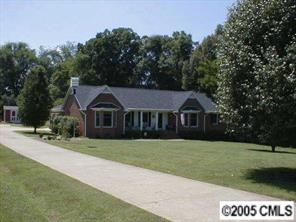 223 Campsite Road Rock Hill, SC 29732 - Photo 1 of 6 a front view of a house with a garden