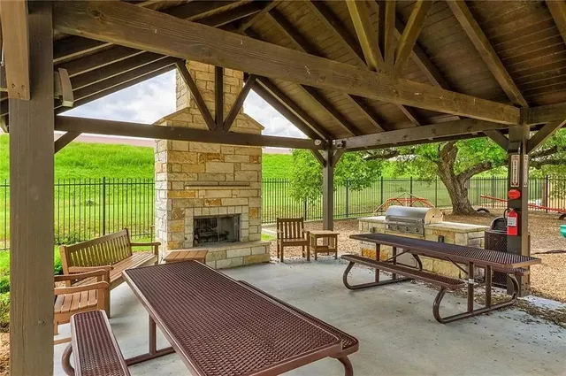 a view of a swimming pool with a lounge chairs