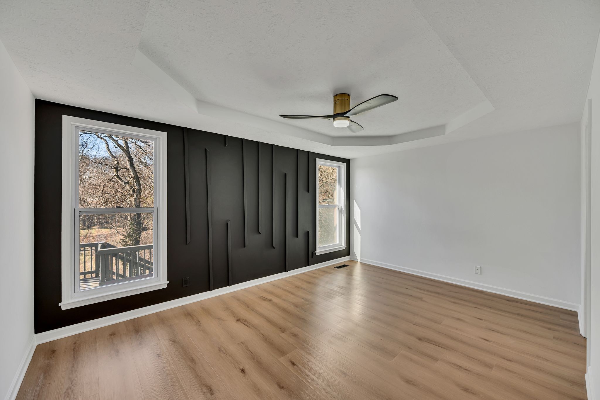 253 Burgandy Hill Road Nashville, TN 37211 - Photo 16 of 28 a view of an empty room with wooden floor and a window