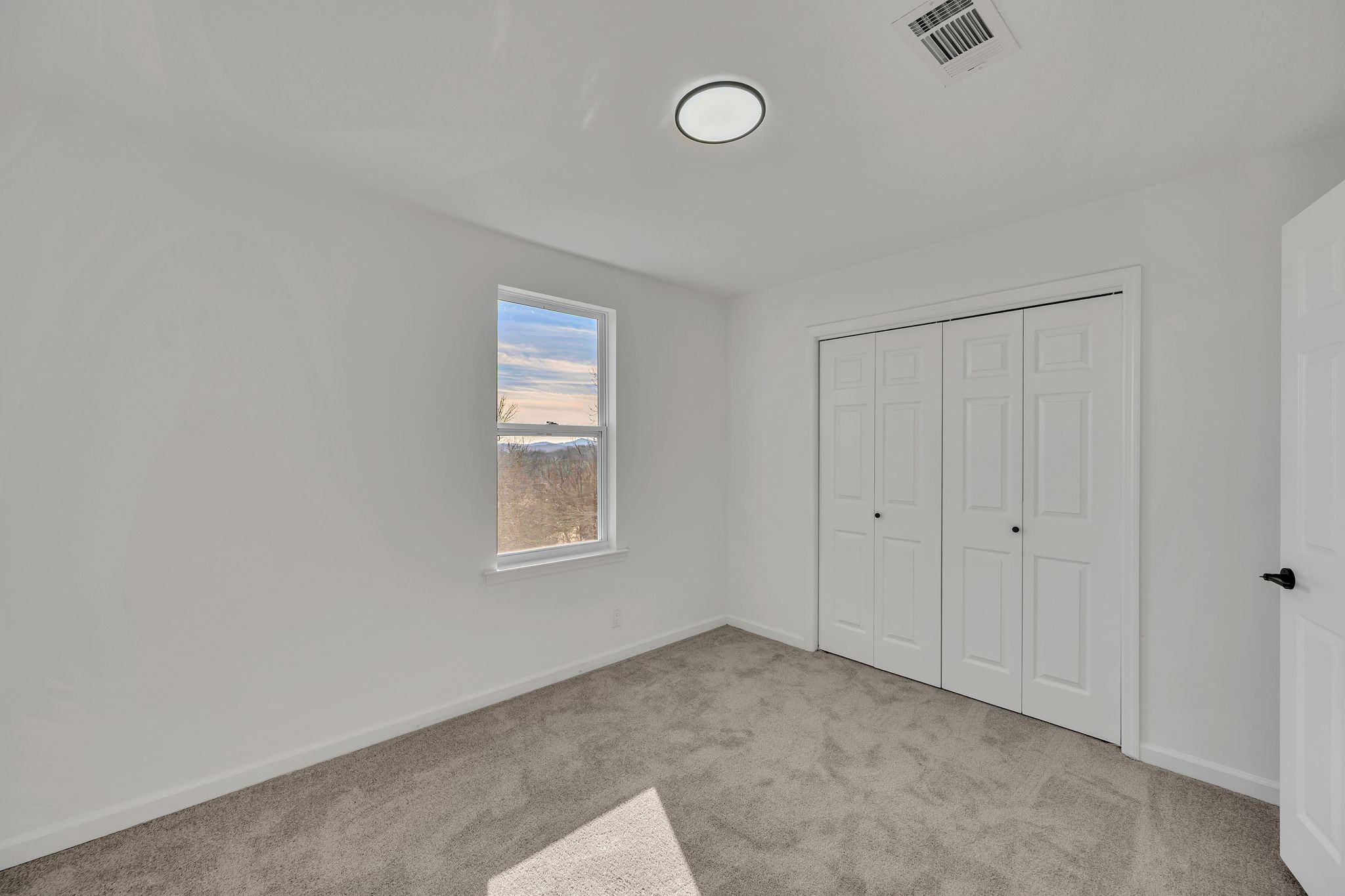 253 Burgandy Hill Road Nashville, TN 37211 - Photo 20 of 28 a view of an empty room with a window