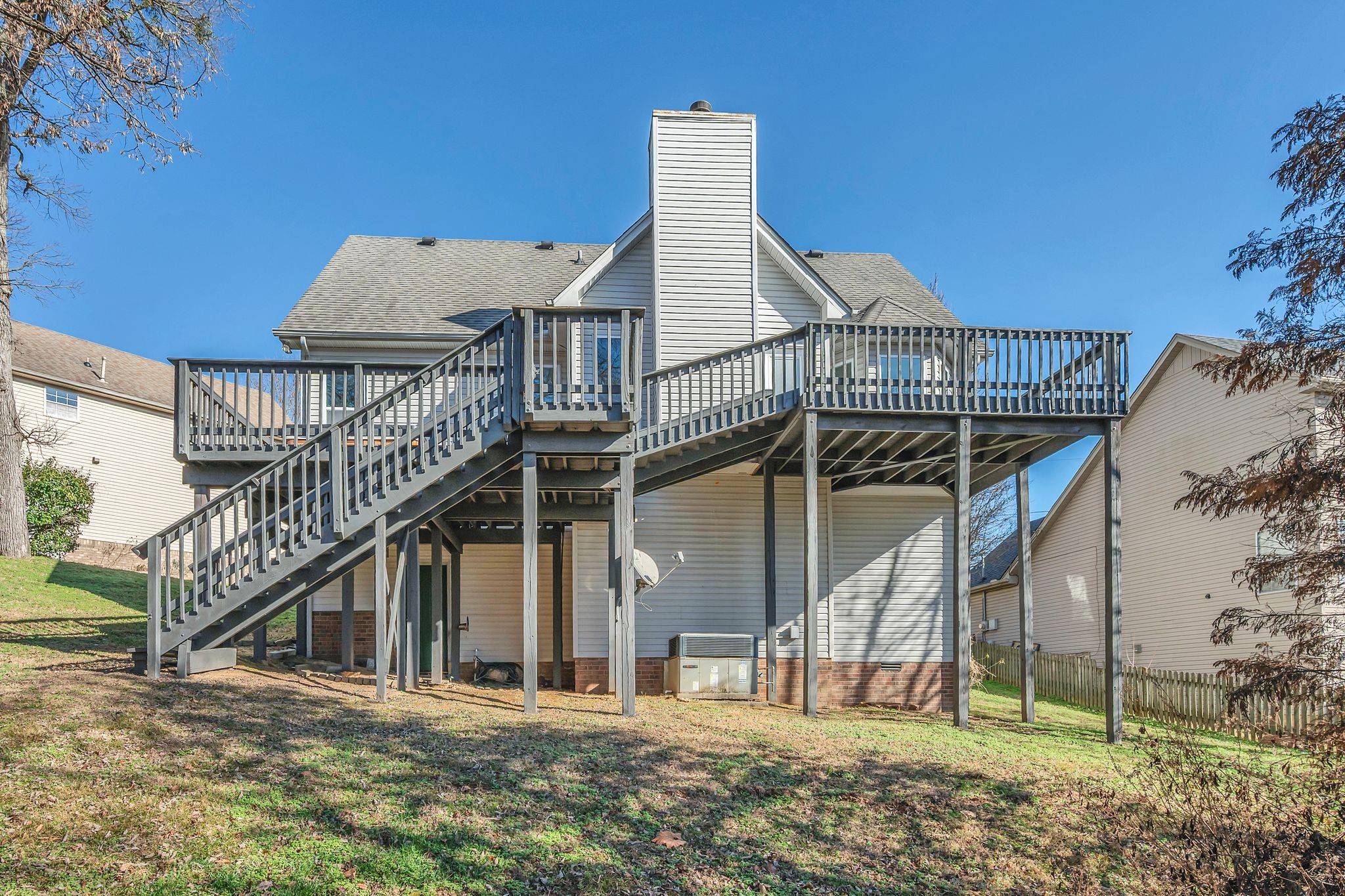 253 Burgandy Hill Road Nashville, TN 37211 - Photo 27 of 28 a view of a house with a small yard and deck