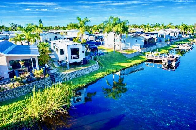 7950 West W Highway, Unit 75 Okeechobee, FL 34974 - Photo 6 of 11 a view of yard with an outdoor seating