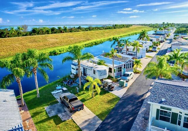 7950 West W Highway, Unit 75 Okeechobee, FL 34974 - Photo 10 of 11 a view of a yard with an outdoor space
