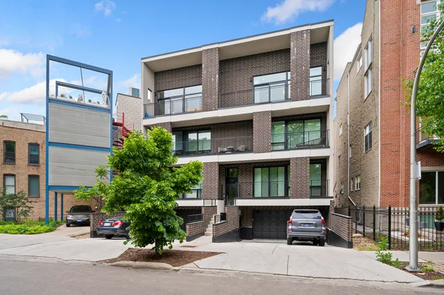a view of brick building with many windows