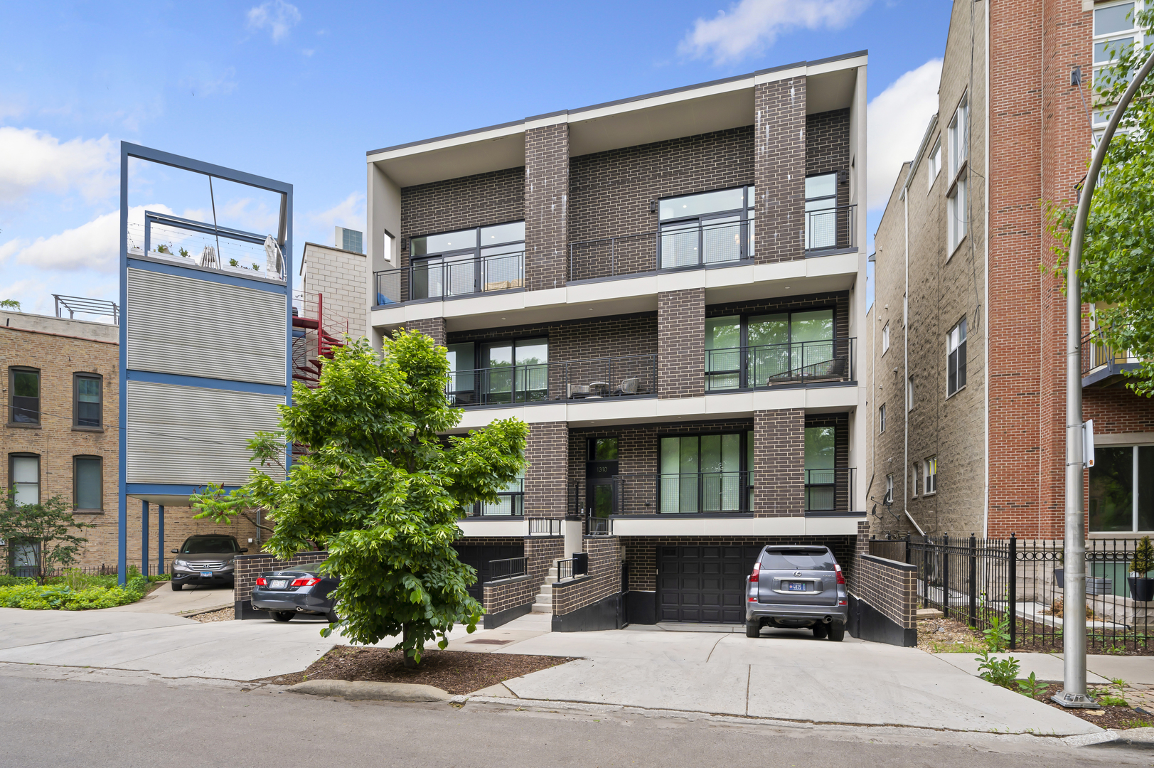 1310 North Cleveland Avenue, Unit 3 Chicago, IL 60610 - Photo 1 of 22 a view of brick building with many windows