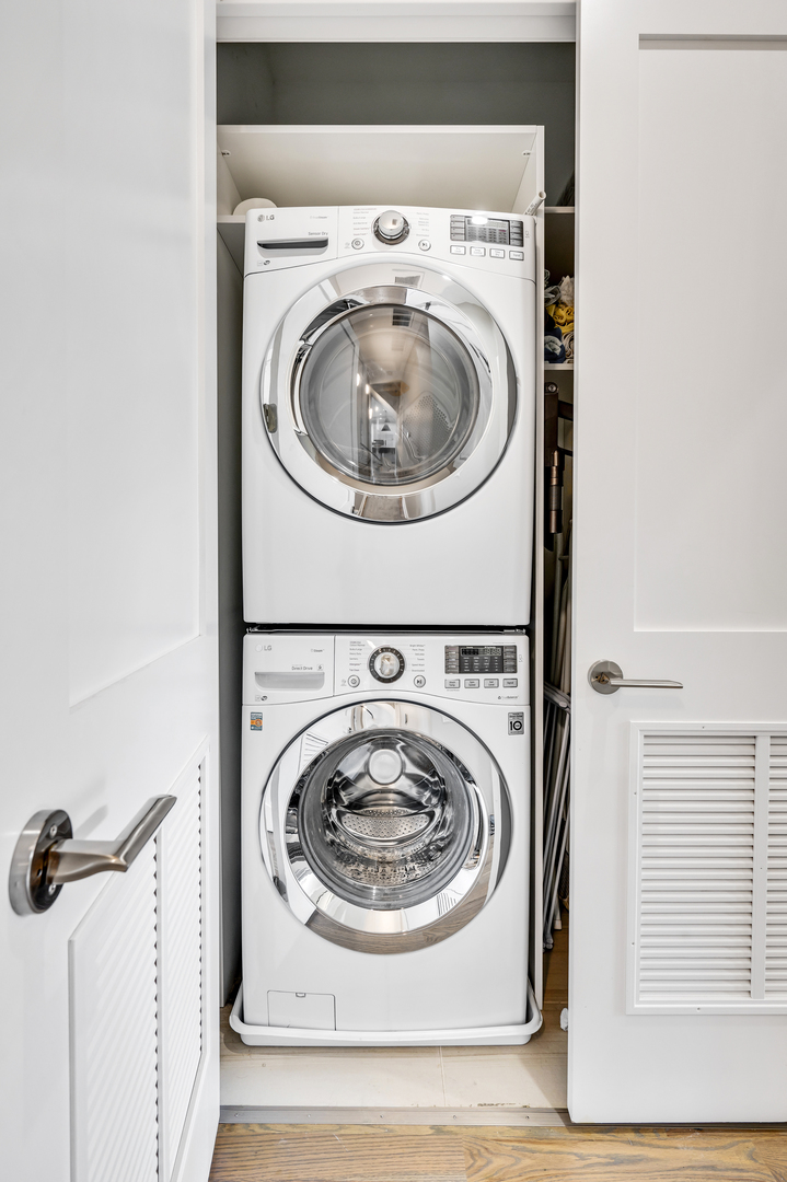 1310 North Cleveland Avenue, Unit 3 Chicago, IL 60610 - Photo 19 of 22 a utility room with dryer and washer