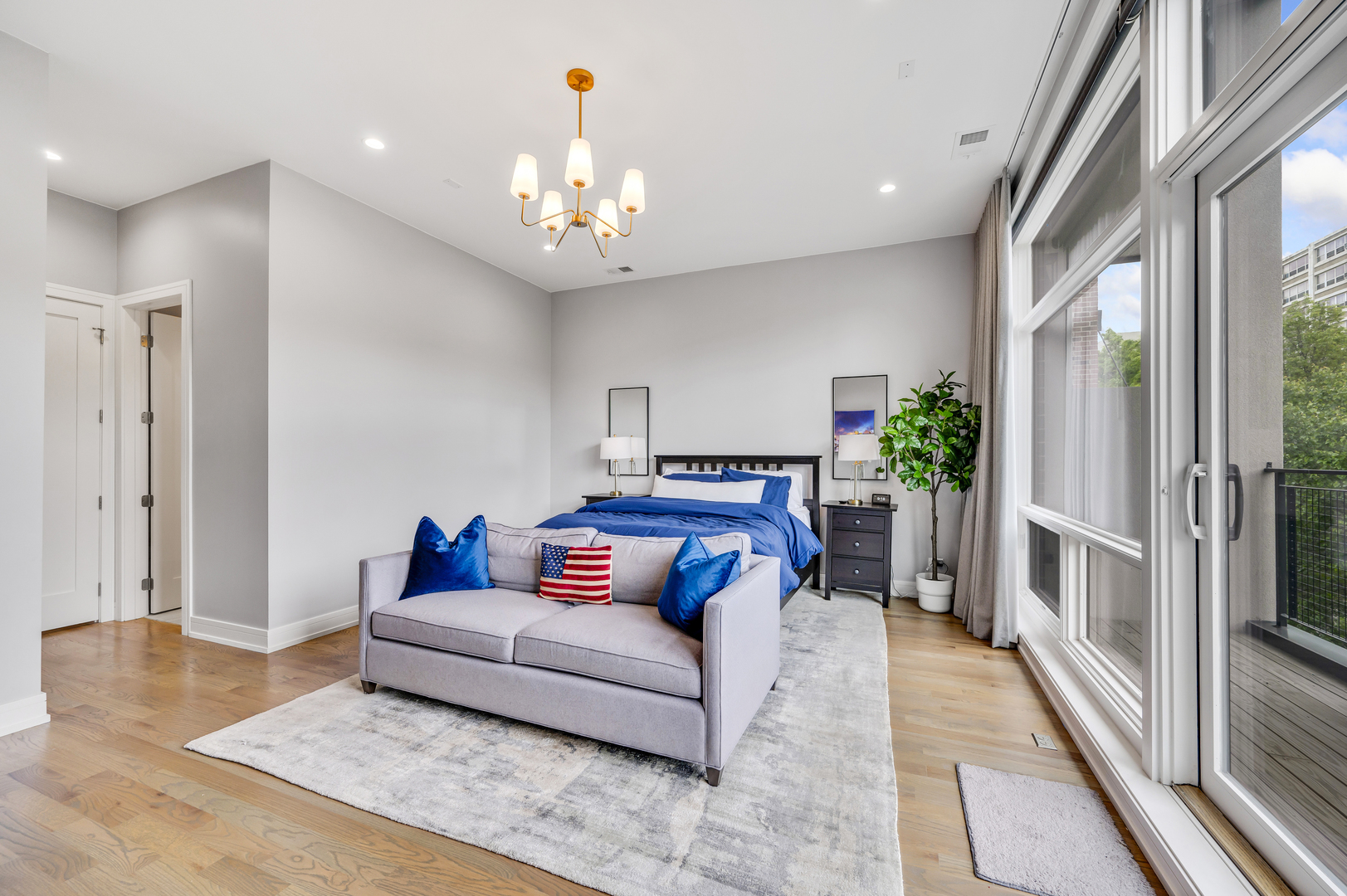 1310 North Cleveland Avenue, Unit 3 Chicago, IL 60610 - Photo 8 of 22 a living room with furniture and a large window
