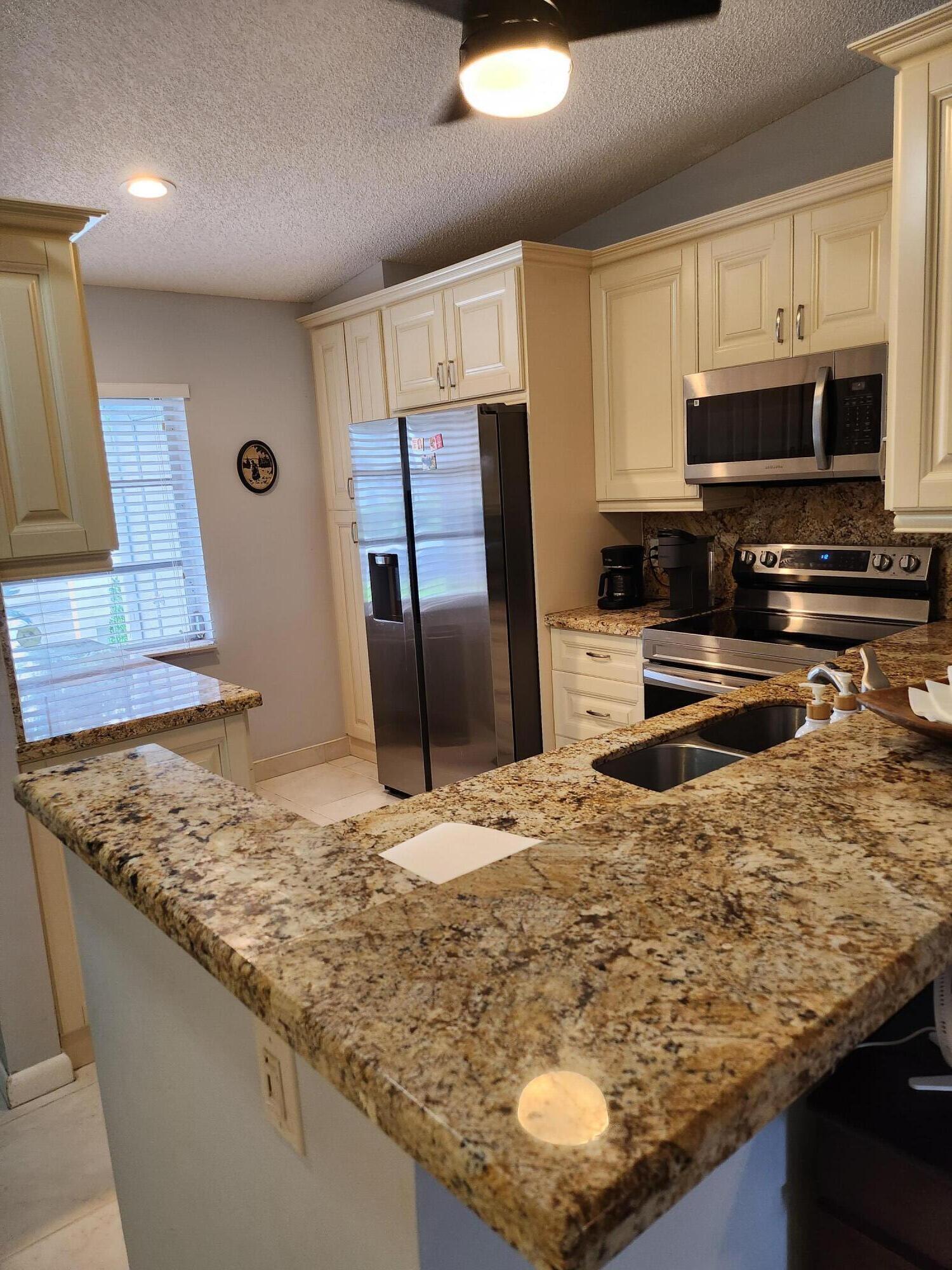 8951 Sunnywood Place Boca Raton, FL 33496 - Photo 7 of 47 8951 SUNNYWOOD PL Boca kitchen 5