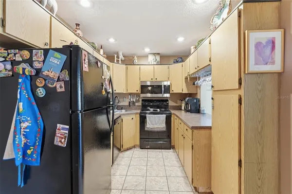 $182,000 | 1345 Pine Ridge Circle East, Unit A2, Tarpon Springs, FL 34688