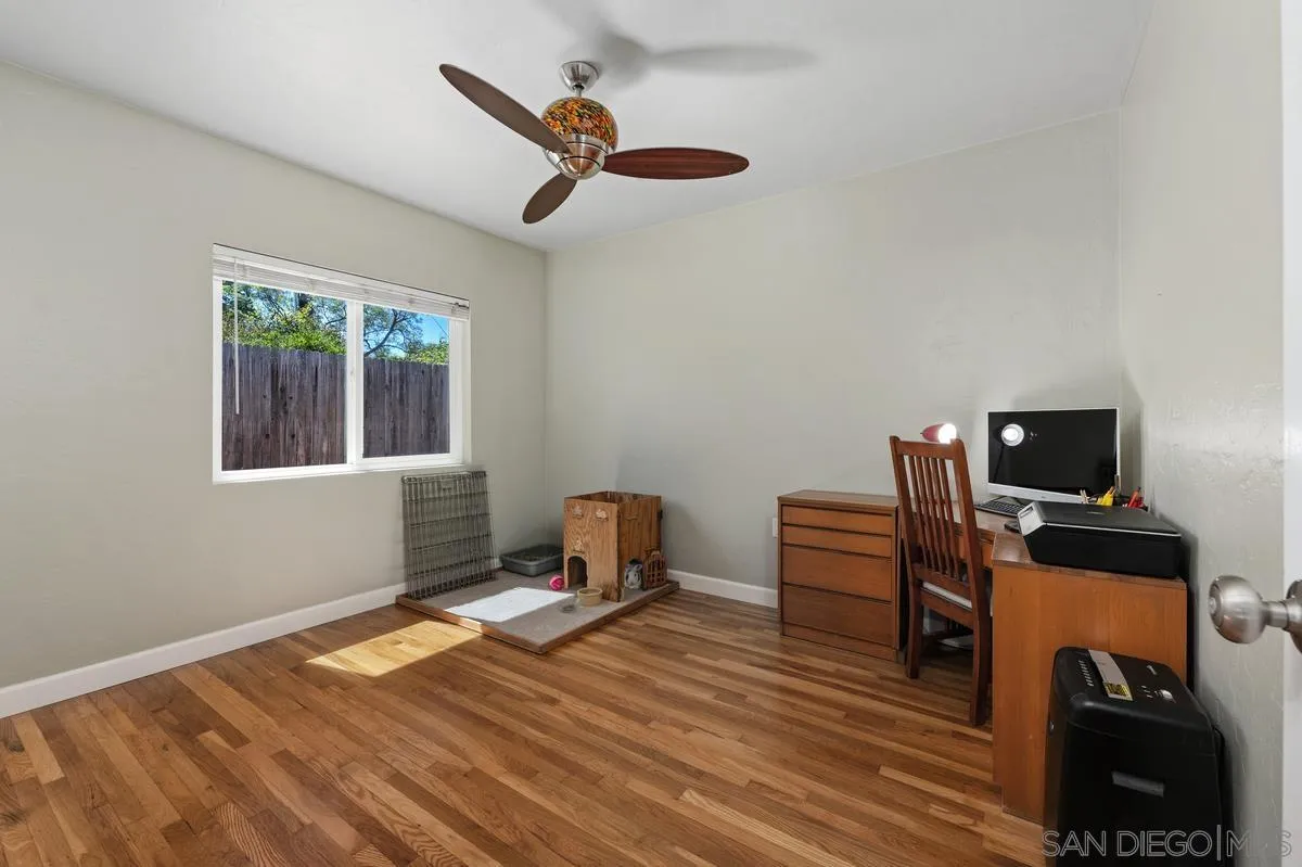 4744 Resmar Road La Mesa, CA 91941 - Photo 11 of 58 a workspace with furniture hardwood and a window