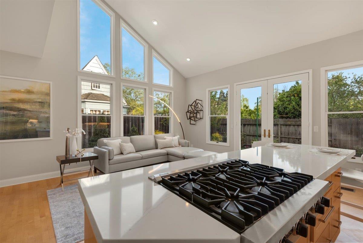 1825 West Middlefield Road Mountain View, CA 94043 - Photo 11 of 42 a living room with furniture and large windows