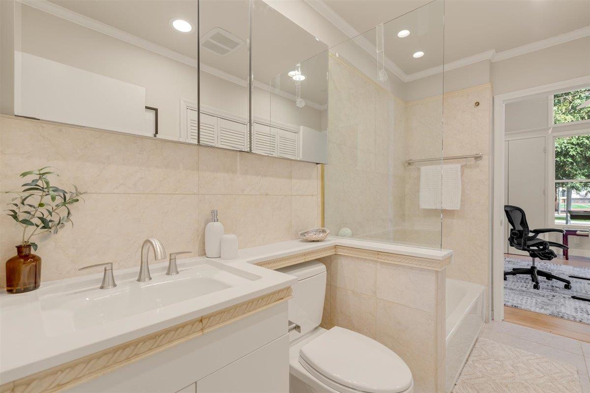 1825 West Middlefield Road Mountain View, CA 94043 - Photo 19 of 42 a bathroom with a sink a toilet and vanity