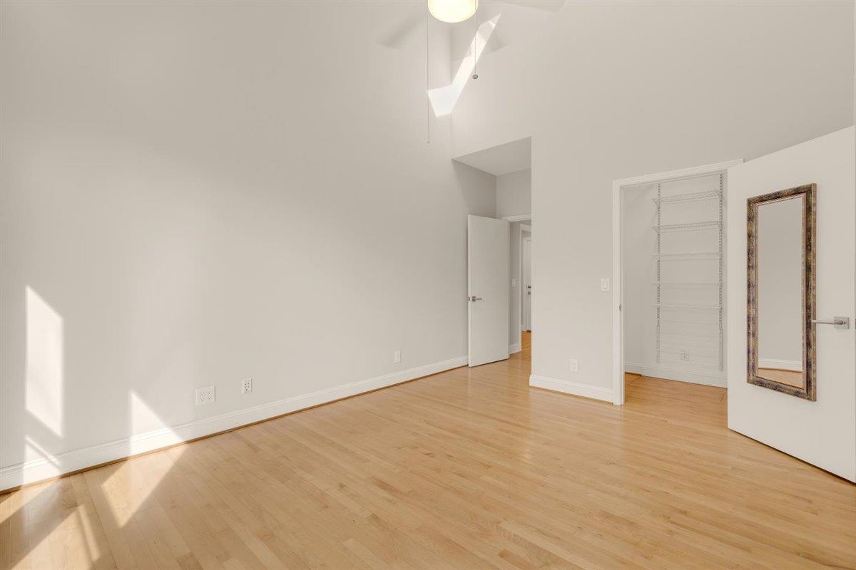 1825 West Middlefield Road Mountain View, CA 94043 - Photo 21 of 42 a view of an empty room with wooden floor