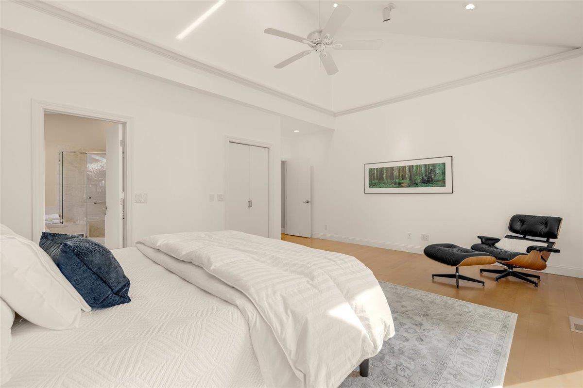 1825 West Middlefield Road Mountain View, CA 94043 - Photo 24 of 42 a bedroom with a bed gym equipment and a window