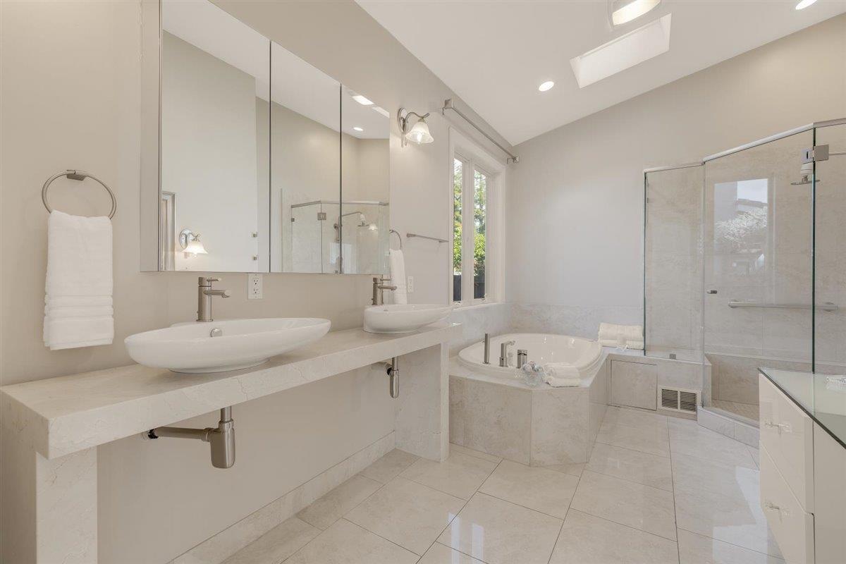 1825 West Middlefield Road Mountain View, CA 94043 - Photo 25 of 42 a bathroom with a sink a tub and a mirror