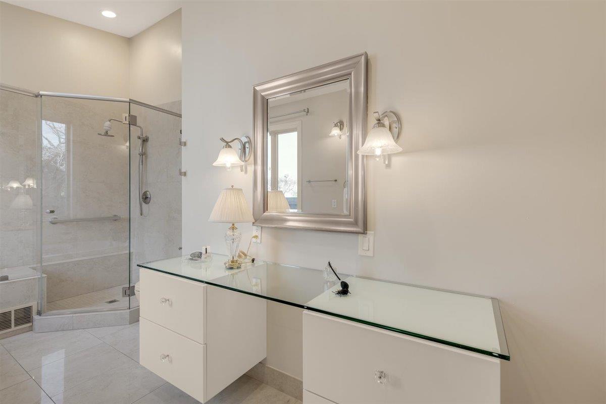 1825 West Middlefield Road Mountain View, CA 94043 - Photo 26 of 42 a bathroom with a double vanity sink mirror and shower