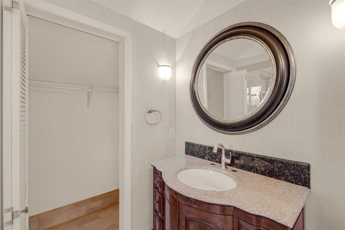 1825 West Middlefield Road Mountain View, CA 94043 - Photo 32 of 42 a bathroom with a sink and a mirror