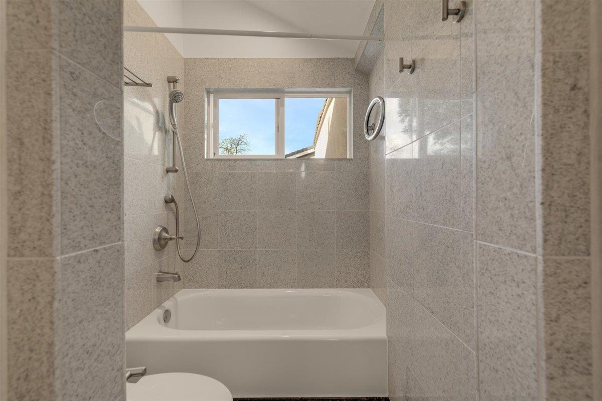 1825 West Middlefield Road Mountain View, CA 94043 - Photo 33 of 42 a bathroom with a bathtub and a shower