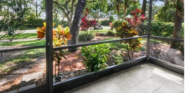 a view of a swimming pool with lounge chair