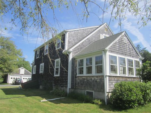 1779 Main Road, Unit LOT 2 Westport, MA 02790 - Photo 4 of 7 a view of a house with a yard