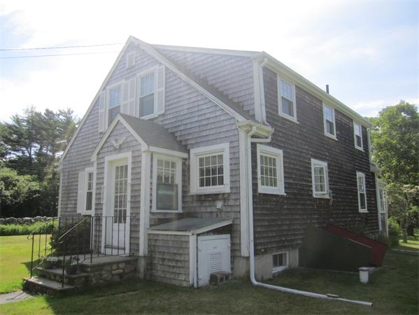 1779 Main Road, Unit LOT 2 Westport, MA 02790 - Photo 5 of 7 a view of a house with a yard