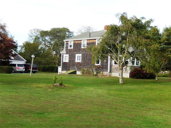 1779 Main Road, Unit LOT 2 Westport, MA 02790 - Photo 6 of 7 a view of a park with a house in the background