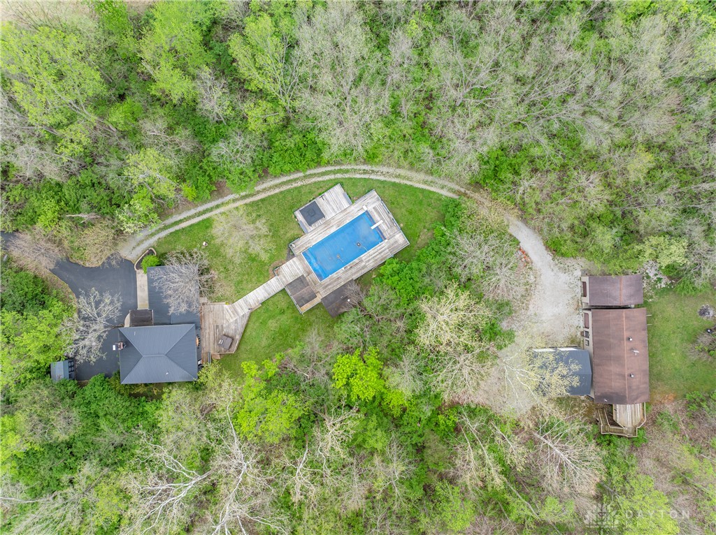 6750 Little Twin Road Germantown, OH 45327 - Photo 79 of 88 This secluded property boasts a refreshing private pool, multiple structures, and a winding driveway.