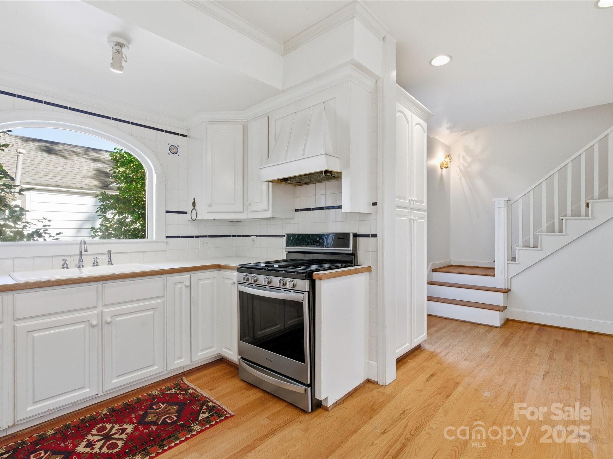 759 Myrtle Drive Rock Hill, SC 29730 - Photo 15 of 47 a kitchen with stainless steel appliances a stove a sink and a refrigerator