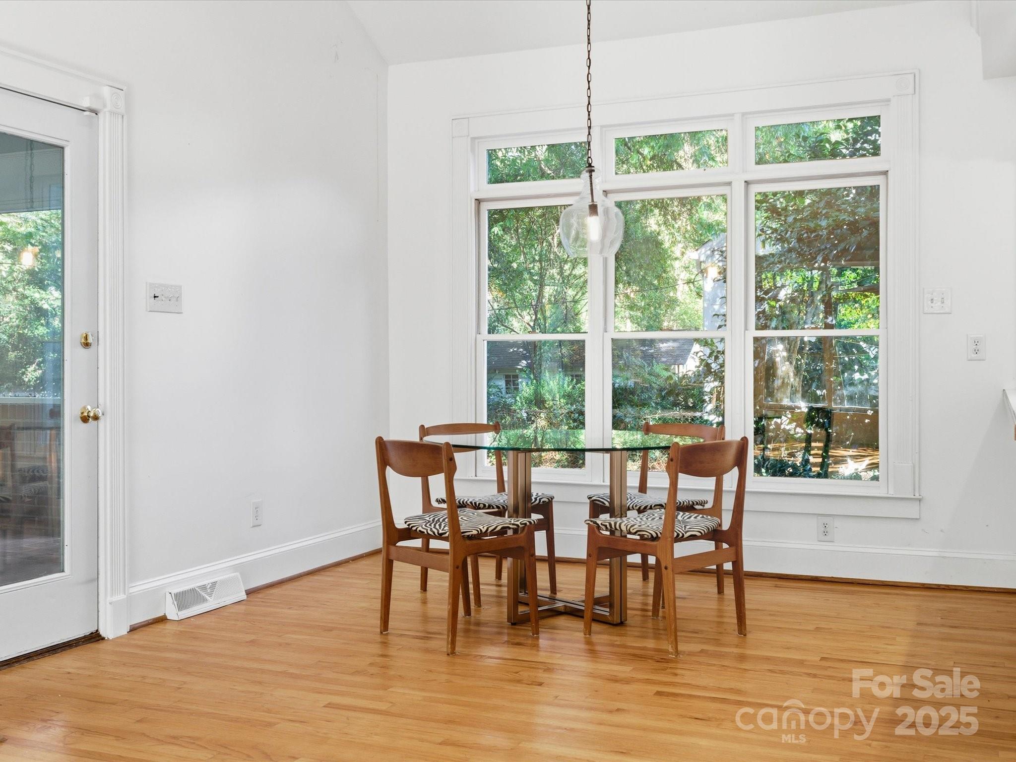 759 Myrtle Drive Rock Hill, SC 29730 - Photo 18 of 47 a view of a dining room with furniture window and wooden floor