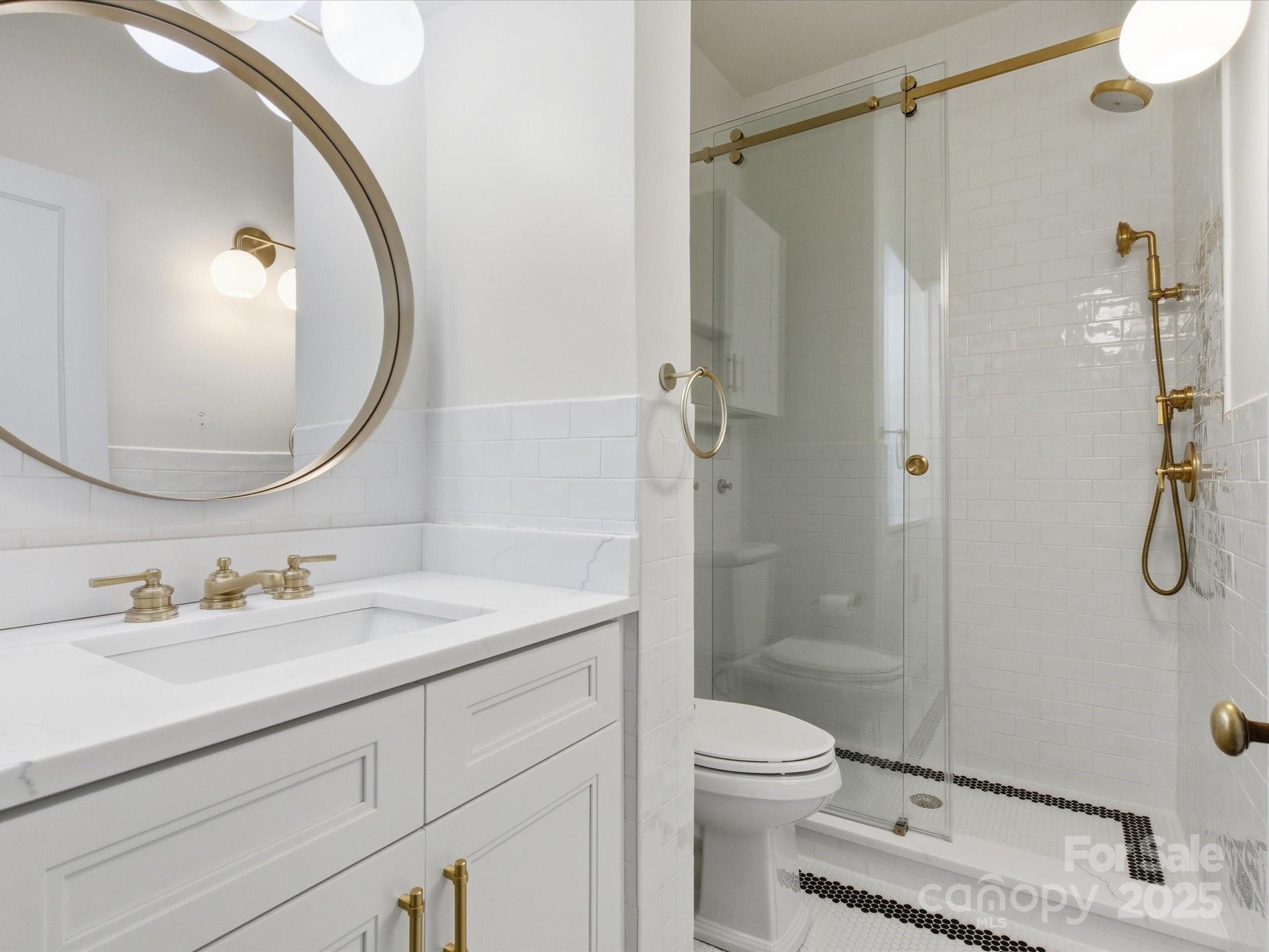 759 Myrtle Drive Rock Hill, SC 29730 - Photo 27 of 47 a bathroom with a sink a toilet and shower