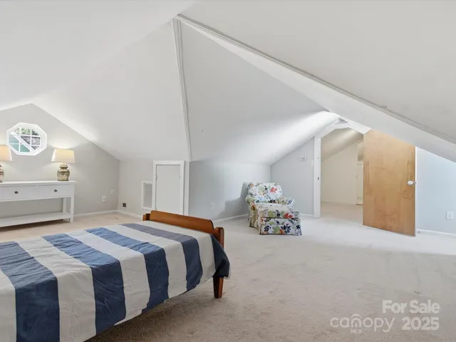 a living room with furniture a piano and a table