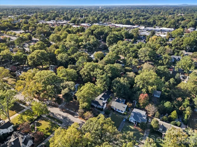 an aerial view of a city with lots of residential buildings