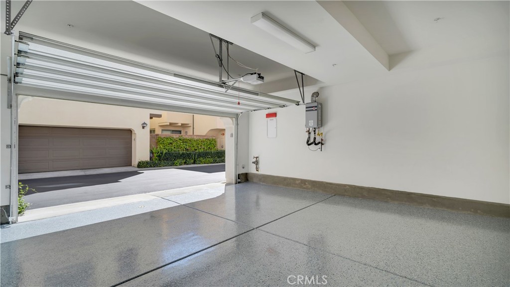 142 Firefly Irvine, CA 92618 - Photo 36 of 65 Garage with epoxy flooring