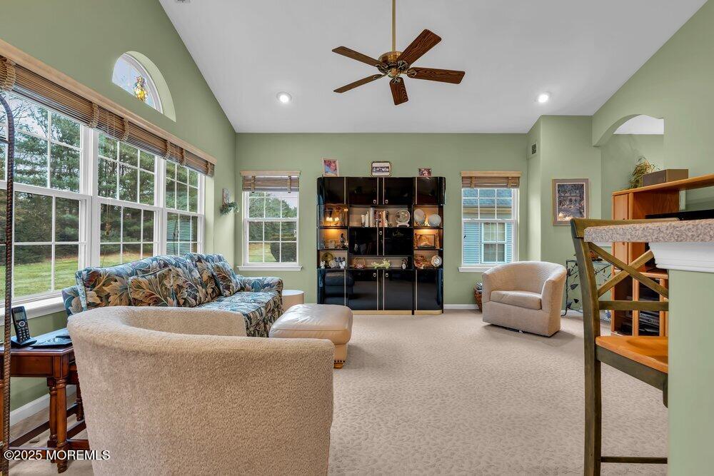 54 Drayton Road Manchester Township, NJ 08759 - Photo 27 of 93 a living room with furniture and a flat screen tv