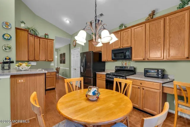 an aerial view of a house with a garden