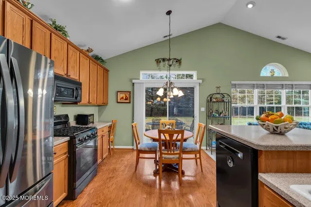 an aerial view of a house with a garden