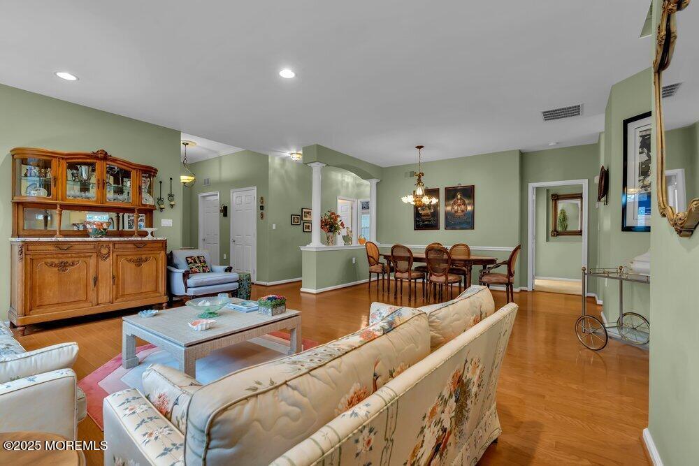 54 Drayton Road Manchester Township, NJ 08759 - Photo 51 of 93 a living room with furniture and a view of kitchen