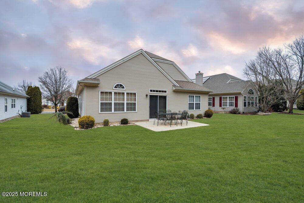 54 Drayton Road Manchester Township, NJ 08759 - Photo 71 of 93 a front view of a house with yard and green space