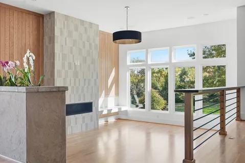 a view of kitchen with furniture and staircase