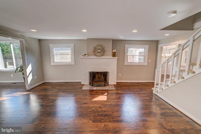 6 Dogwood Road Riva, MD 21140 - Photo 1 of 25 a view of a livingroom with wooden floor and a fireplace