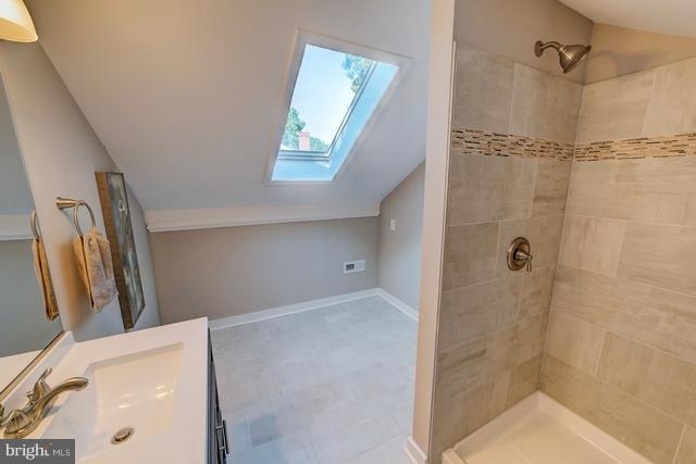 6 Dogwood Road Riva, MD 21140 - Photo 13 of 25 a bathroom with a tub and a shower
