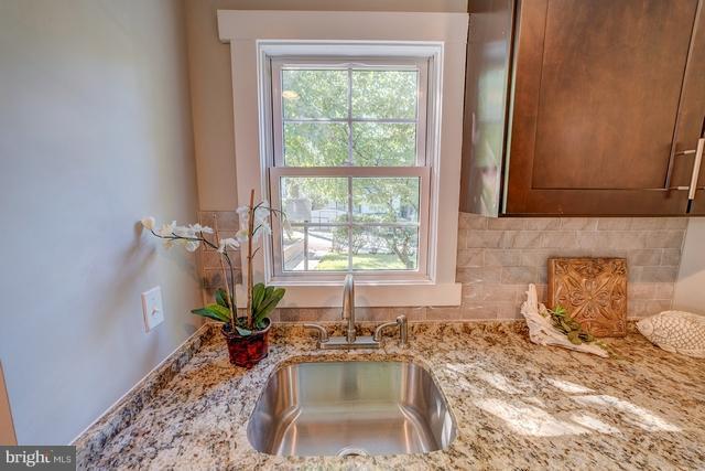 6 Dogwood Road Riva, MD 21140 - Photo 19 of 25 a bath tub sitting in a bathroom next to a window