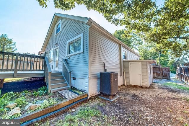 6 Dogwood Road Riva, MD 21140 - Photo 22 of 25 a view of a house with backyard and wooden fence