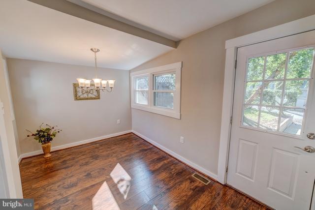 6 Dogwood Road Riva, MD 21140 - Photo 5 of 25 a view of empty room with wooden floor and fan