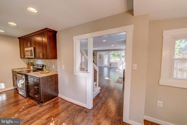 6 Dogwood Road Riva, MD 21140 - Photo 6 of 25 a view of a livingroom with wooden floor and furniture
