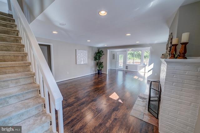 6 Dogwood Road Riva, MD 21140 - Photo 8 of 25 a view of entryway and hall with wooden floor