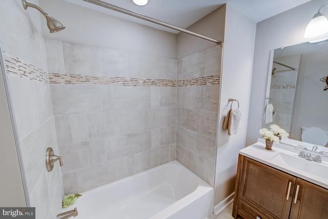 6 Dogwood Road Riva, MD 21140 - Photo 10 of 25 a bathroom with a sink and a bathtub